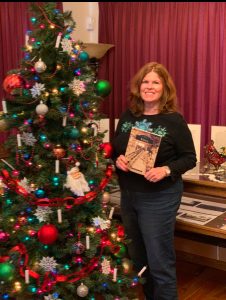 Liz with her Vista history book