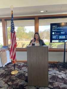 Rachel Beld at the podium