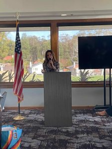 Rita of Blissful Seeds at the podium