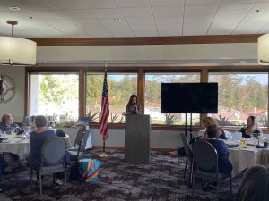 Rita of Blissful Seeds at the podium