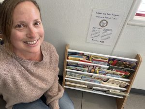 Kati with the first bookshelf installation