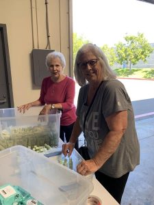 Members helping sort items at FFWW website