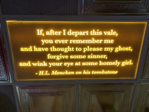 sign hanging on the wall at misadventure