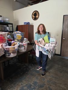 Liz sorting warehouse items